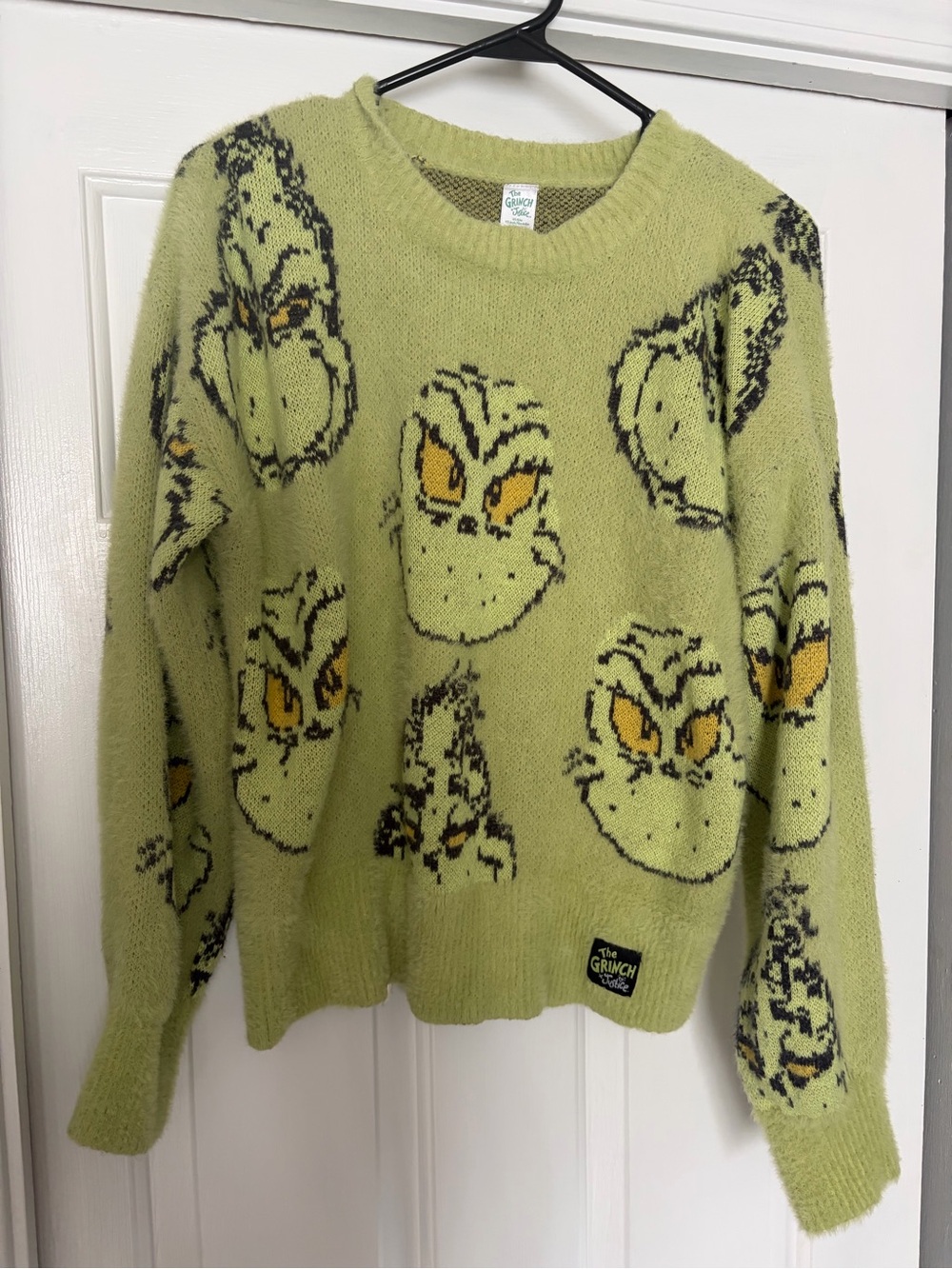 Justice Green Grinch Face Graphic Sweater